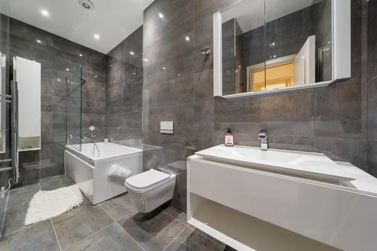 Bathroom with freestanding bath and walk-in shower