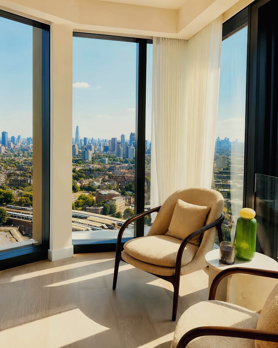 Armchair by floor-to-ceiling glass